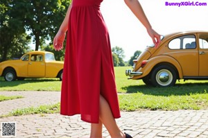 a woman in a white dress posing for a picture