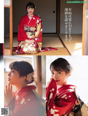 A woman in a red kimono standing in a forest.