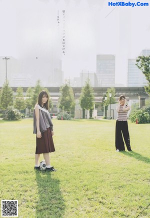 A magazine with two young women standing next to each other.