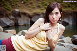 A naked asian woman sitting on a couch in a bamboo forest.